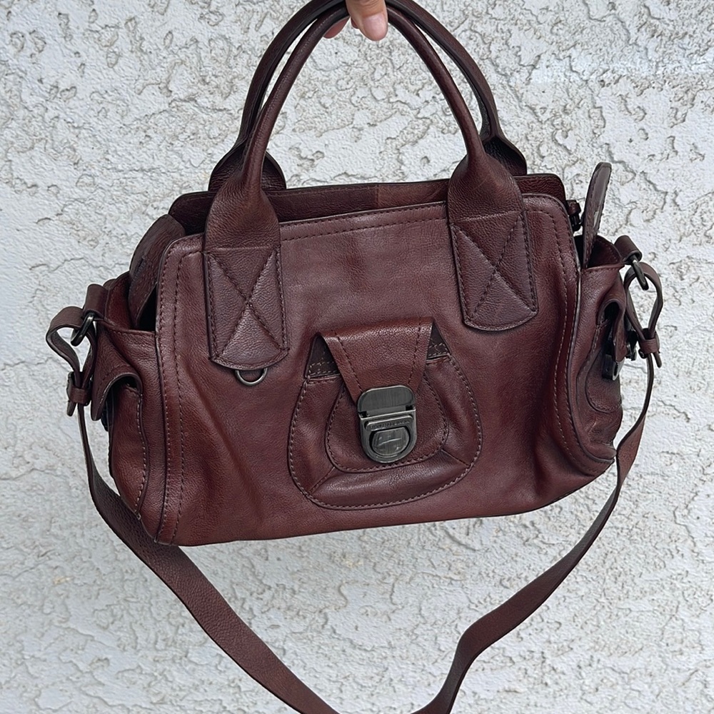Francisco Biasia handbag with adjustable shoulder strap.